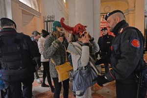 Carabiniere, paramilitary policemen inspects a woman during a Carnival in Venice, Italy, 31 January 2016. ANSA/ANDREA MEROLA